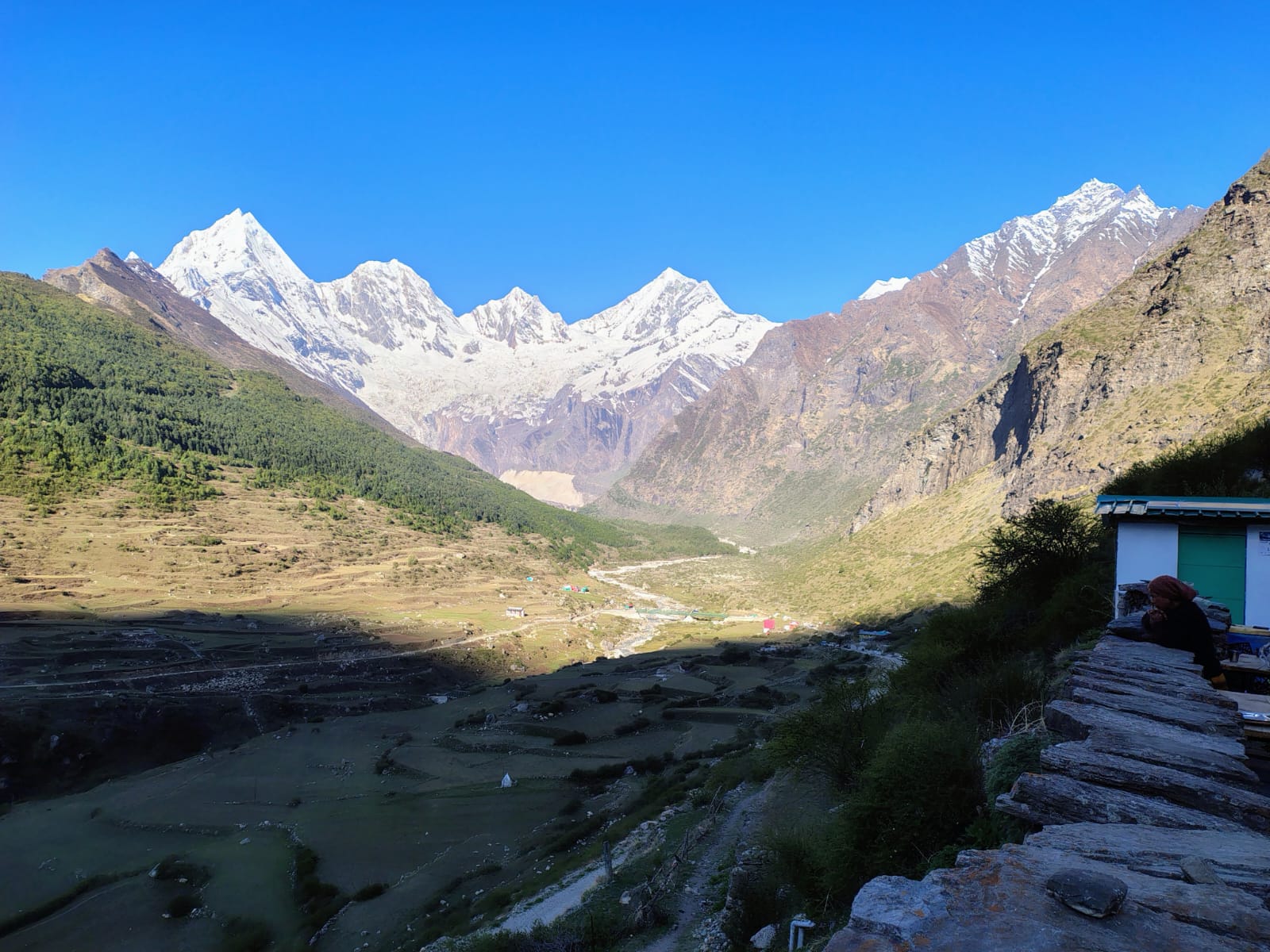 Himalayan village valley and peaks